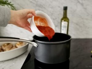 making tomato sauce for chicken