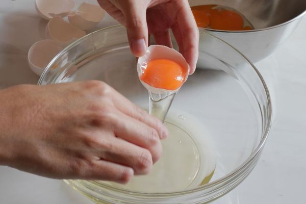 beating eggs for frittata