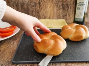 slicing flower shaped bread rolls
