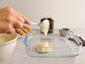 adding yogurt to make healthy tiramisu
