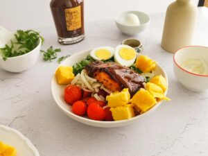 BBQ salmon bowl with cold polenta salad