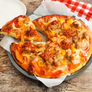 spicy pizza with sausage from Italy