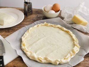 preparing puff pastry for blind baking