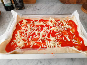 preparing margherita pizza