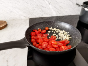 cooking cherry tomatoes with garlic