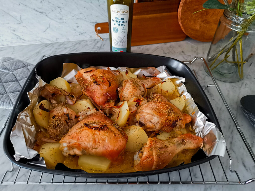 baked chicken legs with potatoes and onions 