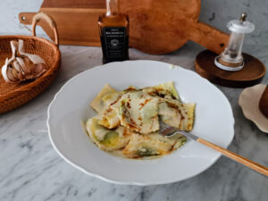 balsamic ravioli with parmesan sauce