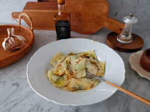 balsamic ravioli with parmesan sauce