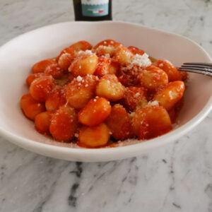 red cacio e pepe gnocchi