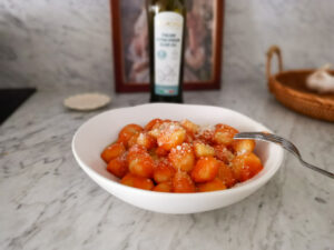 red cacio e pepe gnocchi